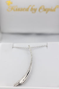 14kt white gold "Swoosh" Fashion Diamond Pendant with 18" chain