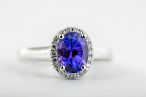 14kt White gold ring with a genuine 1.43ct Tanzanite and .13ct diamonds