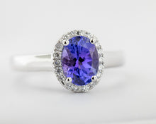 Load image into Gallery viewer, 14kt White gold ring with a genuine 1.43ct Tanzanite and .13ct diamonds