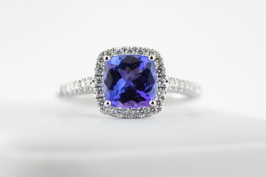 14kt White gold ring with a genuine 1.61ct cushion cut Tanzanite and .28ct diamonds