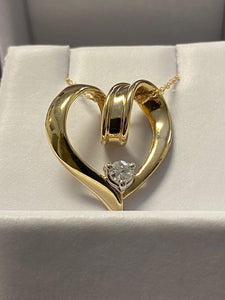 14kt Yellow Gold Heart with a free diamond